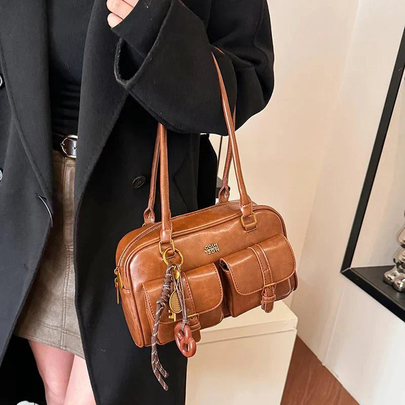 Bolso de mano Jessa con múltiples bolsillos